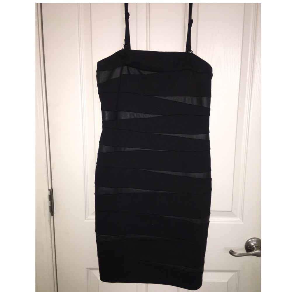 Tube dress faux leather insets removable straps.